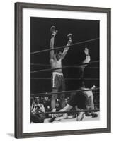 Boxer Muhammad Ali Raising His Gloves Victoriously After Knocking Out Oscar Bonavena-Bill Ray-Framed Premium Photographic Print