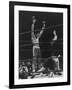 Boxer Muhammad Ali Raising His Gloves Victoriously After Knocking Out Oscar Bonavena-Bill Ray-Framed Premium Photographic Print