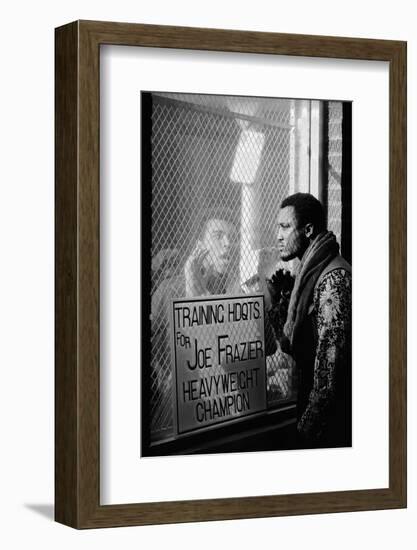 Boxer Muhammad Ali Taunting Boxer Joe Frazier During Training for Their Fight-John Shearer-Framed Photographic Print