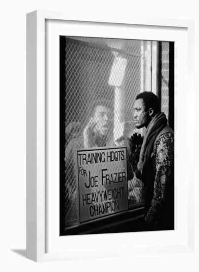 Boxer Muhammad Ali Taunting Boxer Joe Frazier During Training for Their Fight-John Shearer-Framed Photographic Print