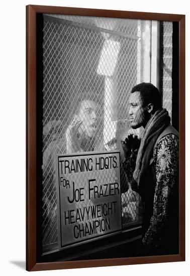 Boxer Muhammad Ali Taunting Boxer Joe Frazier During Training for Their Fight-John Shearer-Framed Photographic Print