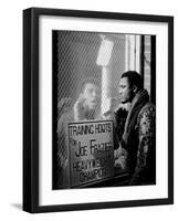 Boxer Muhammad Ali Taunting Rival Joe Frazier at Frazier's Training Headquarters-John Shearer-Framed Premium Photographic Print