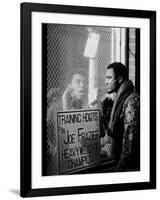 Boxer Muhammad Ali Taunting Rival Joe Frazier at Frazier's Training Headquarters-John Shearer-Framed Premium Photographic Print