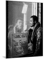 Boxer Muhammad Ali Taunting Rival Joe Frazier at Frazier's Training Headquarters-John Shearer-Mounted Premium Photographic Print