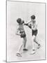 Boxer Throwing a Right Hook-null-Mounted Photo