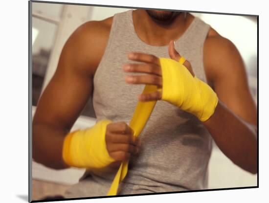 Boxer Wrapping His Hands-Chris Trotman-Mounted Photographic Print