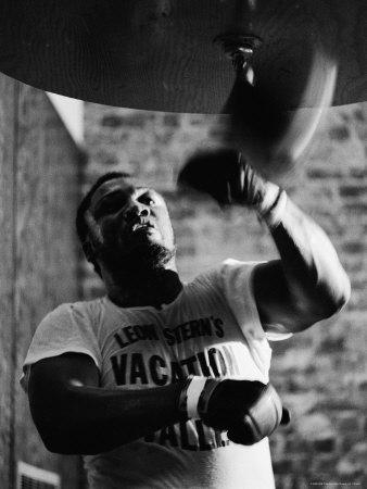 https://imgc.allpostersimages.com/img/posters/boxing-champ-joe-frazier-working-out-for-his-scheduled-fight-against-muhammad-ali_u-L-P479EW0.jpg?artPerspective=n