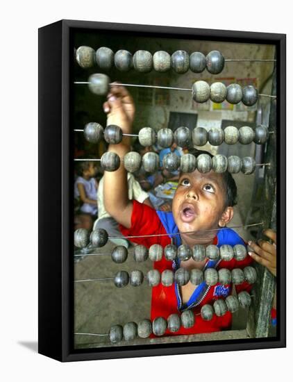 Boy, 3, Counts on an Abacus at a School in Allahabad-null-Framed Stretched Canvas