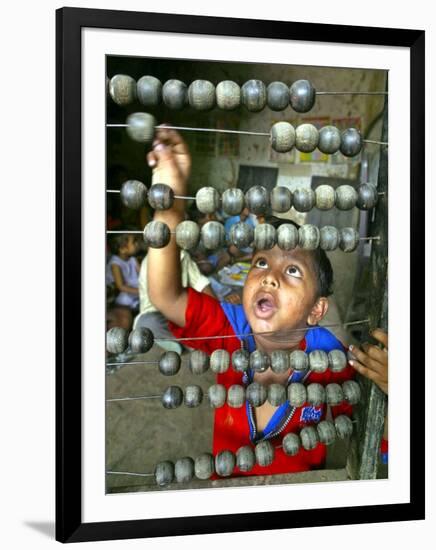 Boy, 3, Counts on an Abacus at a School in Allahabad-null-Framed Photographic Print