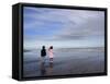 Boy Aged Four and Girl Aged Three on a Black Volcanic Sand Beach in Manawatu, New Zealand-Don Smith-Framed Stretched Canvas