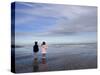Boy Aged Four and Girl Aged Three on a Black Volcanic Sand Beach in Manawatu, New Zealand-Don Smith-Stretched Canvas