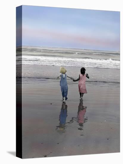 Boy and Girl on at Edge of Ocean Running and Holding Hands.-Nora Hernandez-Stretched Canvas