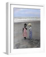 Boy and Girl on Beach Listening to Sea Shell-Nora Hernandez-Framed Giclee Print