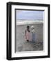 Boy and Girl on Beach Listening to Sea Shell-Nora Hernandez-Framed Giclee Print