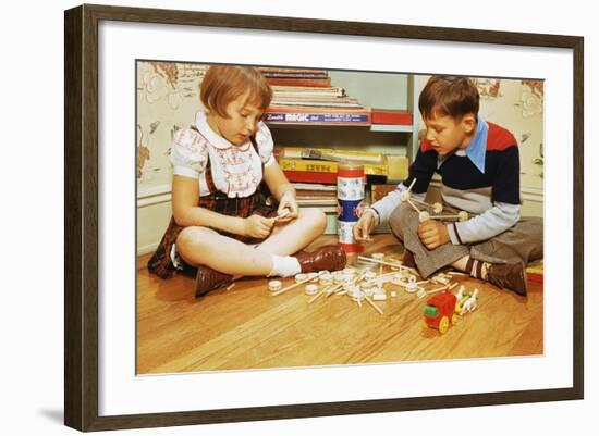 Boy and Girl Playing with Tinkertoys-William P. Gottlieb-Framed Photographic Print