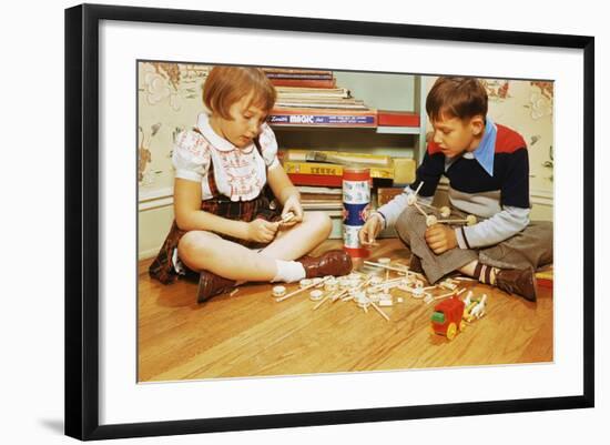 Boy and Girl Playing with Tinkertoys-William P. Gottlieb-Framed Photographic Print