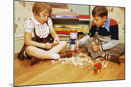 Boy and Girl Playing with Tinkertoys-William P. Gottlieb-Mounted Photographic Print