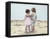 Boy and Girl with their Arms around Each Other on the Beach-Nora Hernandez-Framed Stretched Canvas