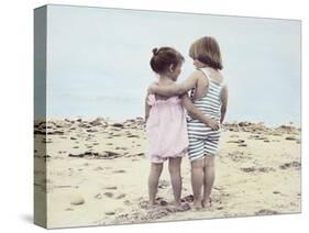 Boy and Girl with their Arms around Each Other on the Beach-Nora Hernandez-Stretched Canvas