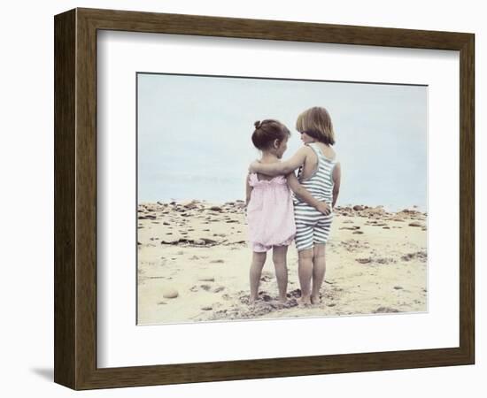 Boy and Girl with their Arms around Each Other on the Beach-Nora Hernandez-Framed Giclee Print