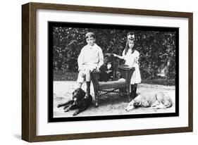 Boy and Girl with Their Four Dogs-null-Framed Art Print