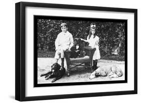 Boy and Girl with Their Four Dogs-null-Framed Art Print