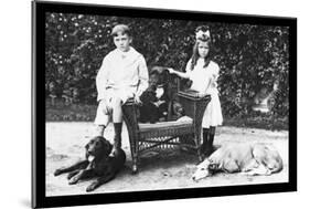 Boy and Girl with Their Four Dogs-null-Mounted Art Print