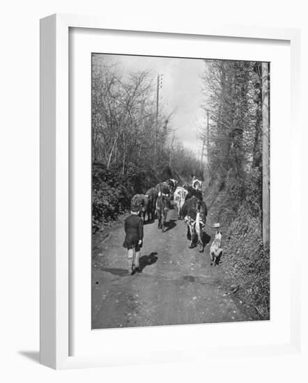 Boy and His Dog Driving the Cows in for Milking-null-Framed Photographic Print