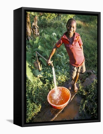 Boy at Water Tap, Chuka Village, Mount Kenya, Kenya, East Africa, Africa-Duncan Maxwell-Framed Stretched Canvas