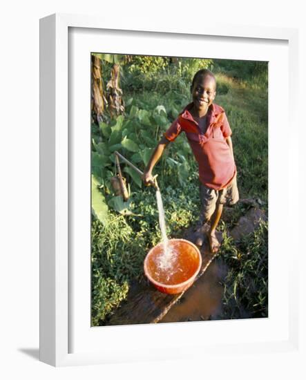 Boy at Water Tap, Chuka Village, Mount Kenya, Kenya, East Africa, Africa-Duncan Maxwell-Framed Photographic Print