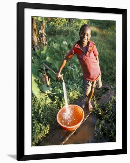 Boy at Water Tap, Chuka Village, Mount Kenya, Kenya, East Africa, Africa-Duncan Maxwell-Framed Photographic Print