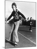 Boy Balances on His Skateboard with a Look of Concentration on His Face-Gill Emberton-Mounted Photographic Print