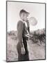 Boy Blowing a Balloon-Philip Gendreau-Mounted Photographic Print