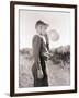 Boy Blowing a Balloon-Philip Gendreau-Framed Photographic Print