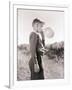 Boy Blowing a Balloon-Philip Gendreau-Framed Photographic Print