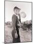 Boy Blowing a Balloon-Philip Gendreau-Mounted Photographic Print