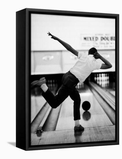 Boy Bowling at a Local Bowling Alley-Art Rickerby-Framed Stretched Canvas