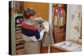 Boy Brushing His Suit Jacket-William P. Gottlieb-Stretched Canvas