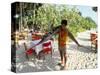 Boy Carrying Freshly Caught Swordfish, Embudu, the Maldives, Indian Ocean-Fraser Hall-Stretched Canvas