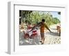 Boy Carrying Freshly Caught Swordfish, Embudu, the Maldives, Indian Ocean-Fraser Hall-Framed Photographic Print