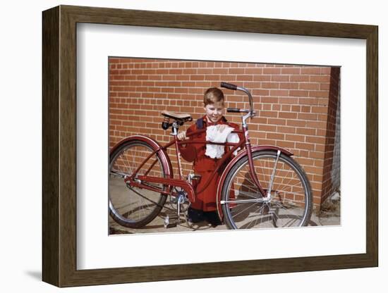 Boy Cleaning His Bike-William P. Gottlieb-Framed Photographic Print