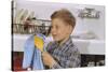 Boy Drying Serving Spoon-William P. Gottlieb-Stretched Canvas