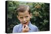 Boy Eating a Raspberry-William P. Gottlieb-Stretched Canvas