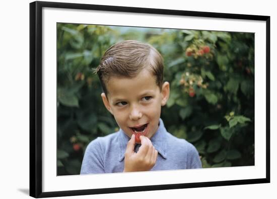 Boy Eating a Raspberry-William P. Gottlieb-Framed Photographic Print