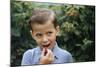Boy Eating a Raspberry-William P. Gottlieb-Mounted Photographic Print