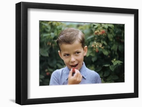 Boy Eating a Raspberry-William P. Gottlieb-Framed Photographic Print