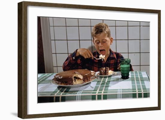 Boy Eating a Slice of Cake-William P. Gottlieb-Framed Photographic Print