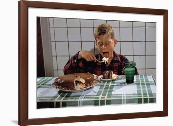 Boy Eating a Slice of Cake-William P. Gottlieb-Framed Photographic Print