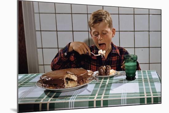 Boy Eating a Slice of Cake-William P. Gottlieb-Mounted Photographic Print