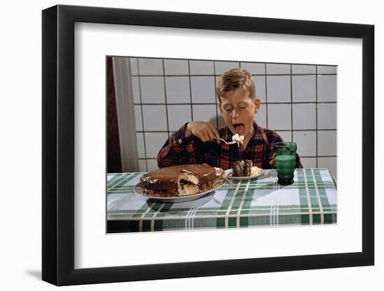 Boy Eating a Slice of Cake-William P. Gottlieb-Framed Photographic Print